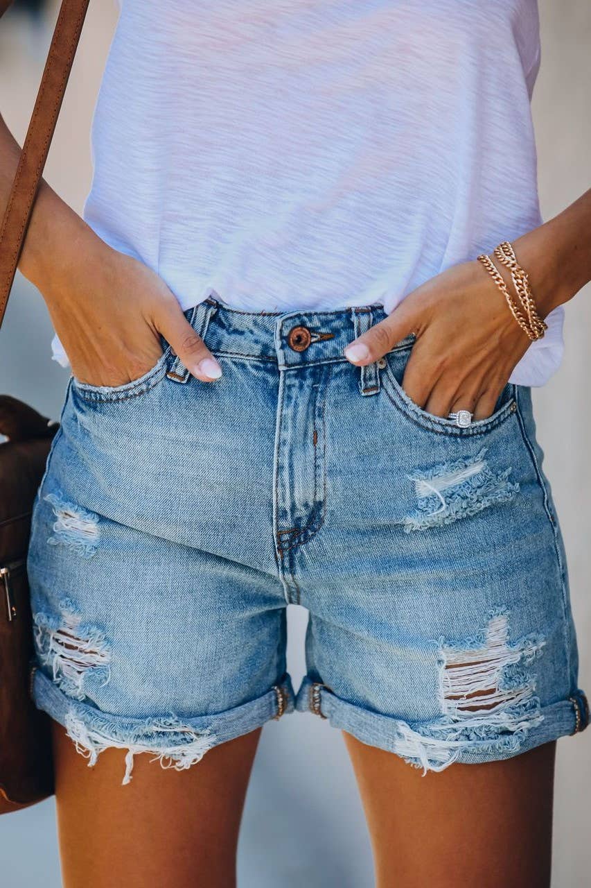 Vintage wash high rise ripped fringed denim shorts