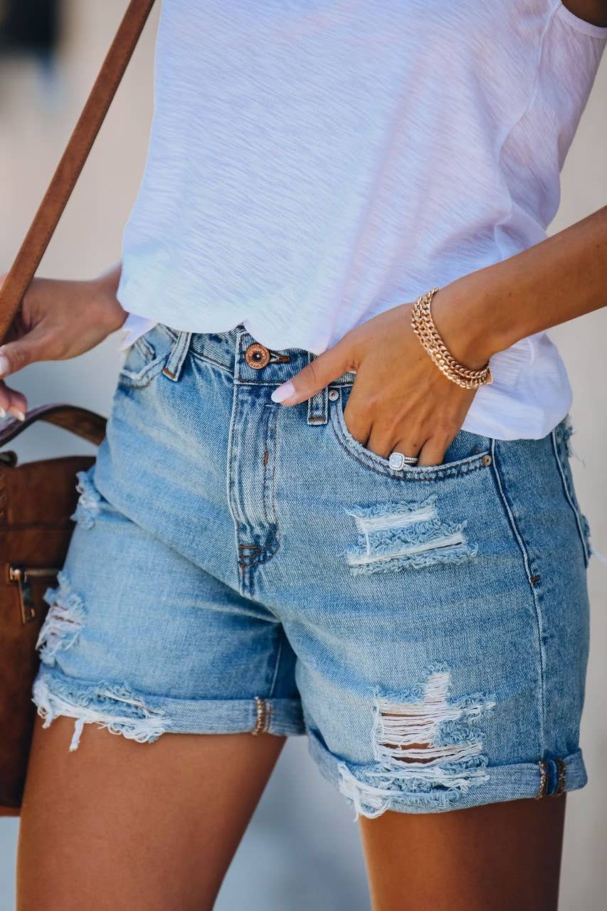 Vintage wash high rise ripped fringed denim shorts